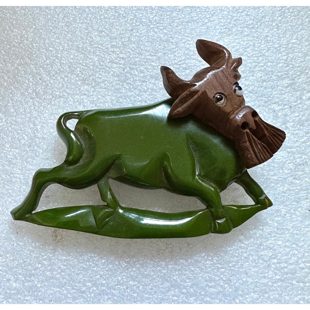 Green Carved Bakelite Bull Pin Articulated Head